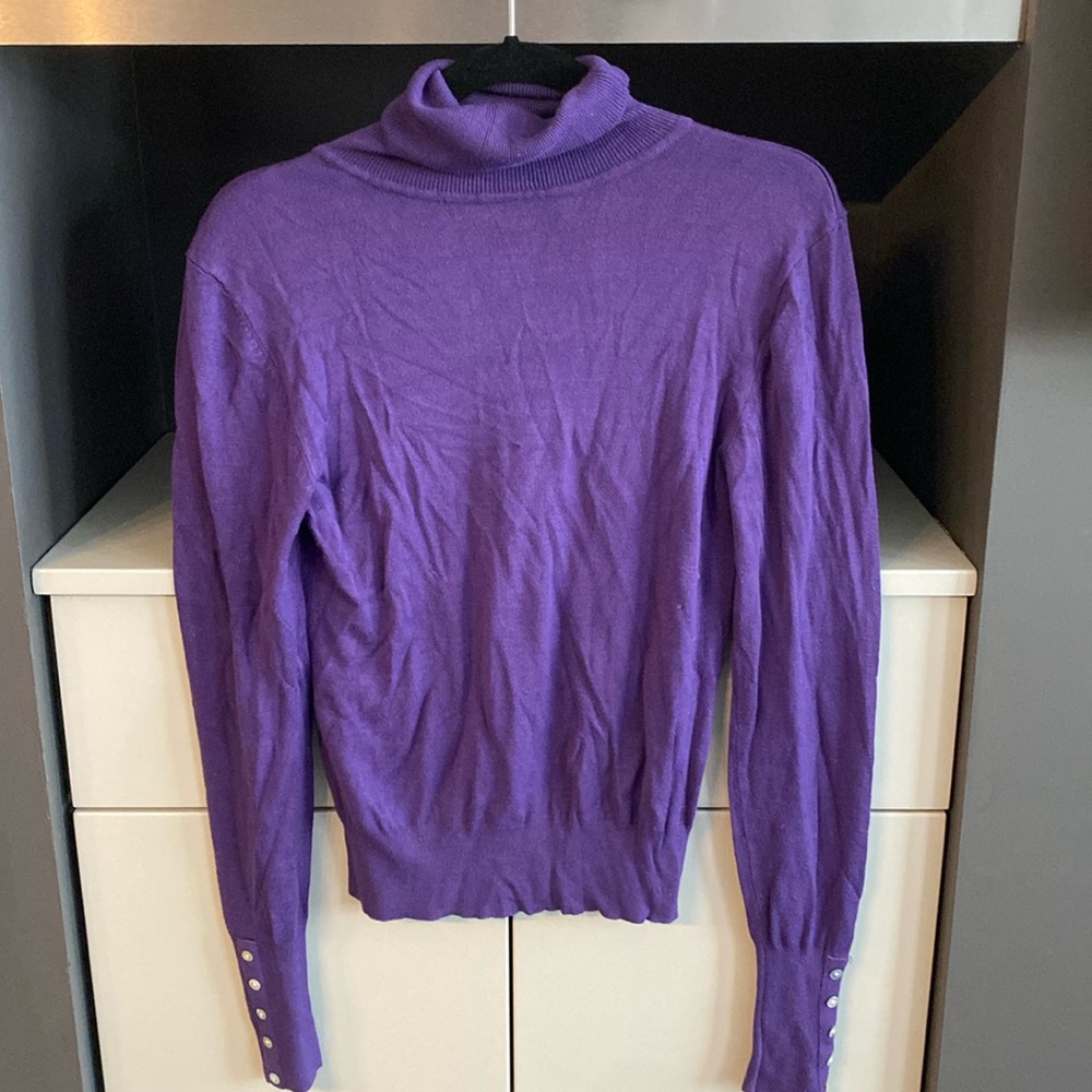 Large fits med/large nice sweater with button accent on arms